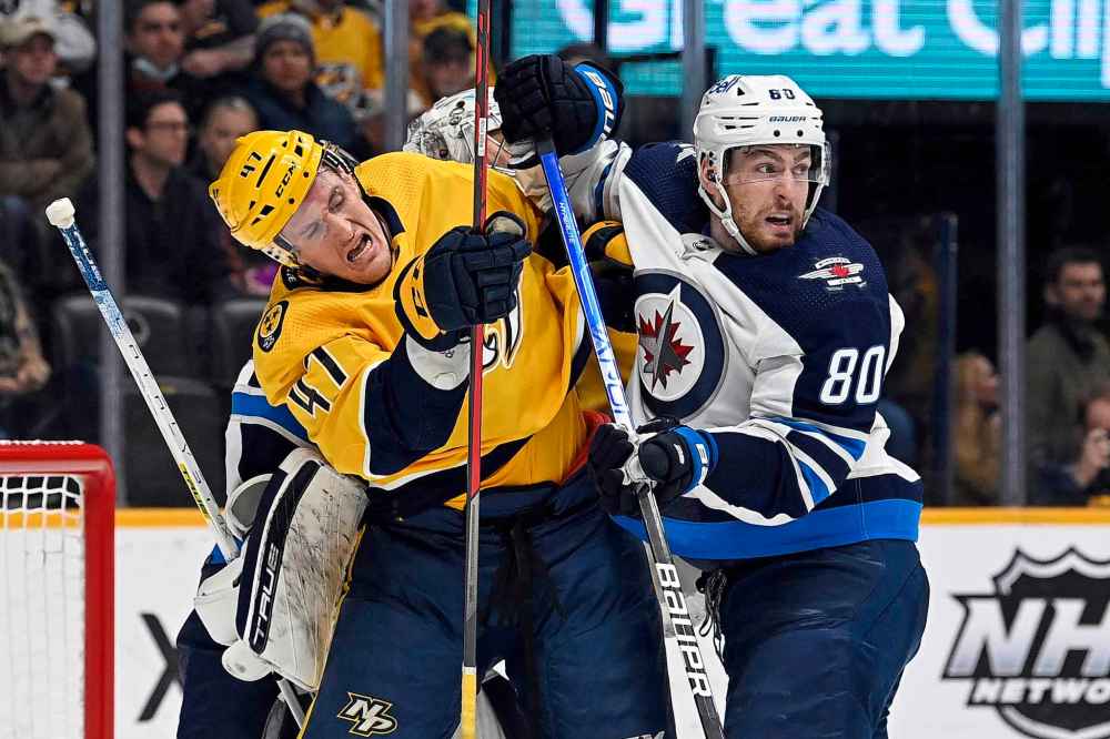 CP
Nashville Predators' Michael McCarron and Winnipeg Jets' Pierre-Luc Dubois battle to get position in the crease during the second period. (Mark Zaleski / The Associated Press)