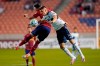 Real Salt Lake midfielder Damir Kreilach, rear, defends against Vancouver Whitecaps defender Ranko Veselinovic (4) in the first half during an MLS soccer match Saturday, Sept. 19, 2020, in Sandy, Utah. (AP Photo/Rick Bowmer)