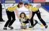 Team Manitoba's third Karlee Burgess and second Emily Zacharias sweep for skip Mackenzie Zacharias while playing against Team Alberta. (TREVOR HAGAN / WINNIPEG FREE PRESS)