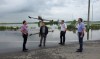 (Ron Schuler on Twitter)
Mayor Rick Chrest shows off the flooded road to Brandon Municipal Airport to visiting Infrastructure Minister Ron Schuler, Brandon East MLA Len Isleifson and Brandon West MLA and Central Services Minister Reg Helwer (left to right) on Tuesday.
