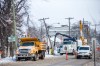 A Hydro pole was toppled near Henderson Highway and Roosevelt Place on Monday after an argument between drivers at a nearby parking lot. (Mikaela MacKenzie / Winnipeg Free Press)