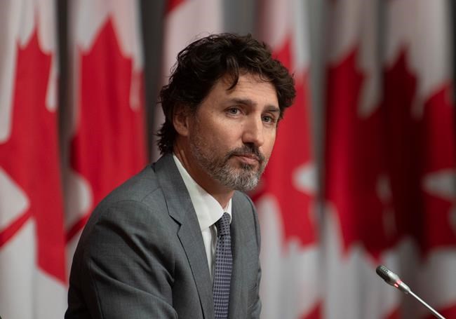 Prime Minister Justin Trudeau listens to a question during a news conference, Wednesday, July 8, 2020 in Ottawa. THE CANADIAN PRESS/Adrian Wyld