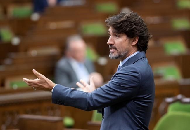 Prime Minister Justin Trudeau rises to respond to questions from the opposition during a sitting of the Special Committee on the COVID-19 Pandemic in the House of Commons Wednesday July 22, 2020 in Ottawa. MPs on the House of Commons ethics committee will meet this afternoon to push forward their own parliamentary probe of the federal government's aborted deal with WE Charity to run a student-volunteer program. THE CANADIAN PRESS/Adrian Wyld