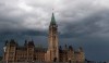 Storm clouds pass by the Peace tower and Parliament hill Tuesday August 18, 2020 in Ottawa. THE CANADIAN PRESS/Adrian Wyld