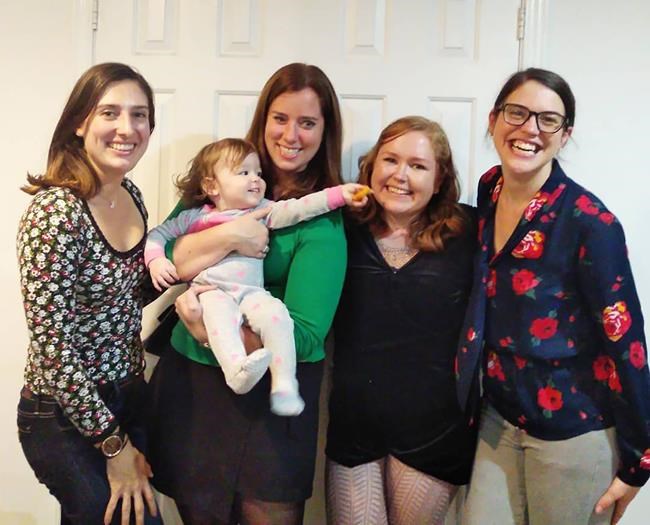 Genna Buck (far right) poses with friends (left to right) Odette Hutchings, Beth McNeil, and Hilary Holden Straus at Buck's fifth annual Friendsgiving celebration in Toronto — the last in-person Friendsgiving before the COVID-19 pandemic, in a handout photo. THE CANADIAN PRESS/HO-Genna Buck MANDATORY CREDIT