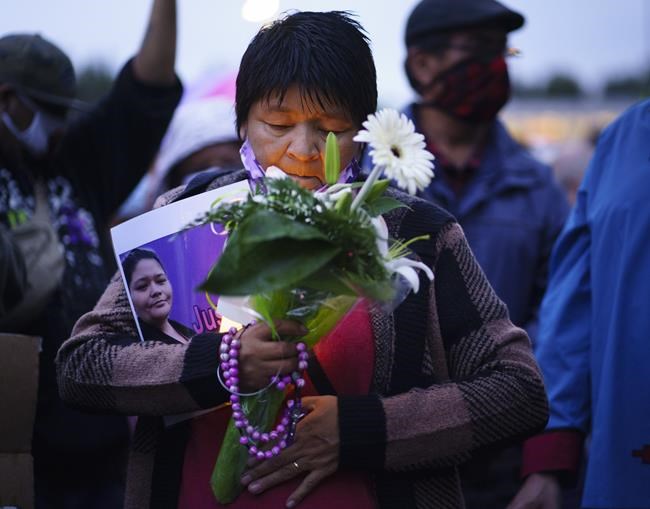 Diane Echaquan Dube, mother of Joyce Echaquan, attends a vigil in front of the hospital in Joliette, Que. on Tuesday, September 29, 2020. A nurse has been fired after an Indigenous woman who was dying Monday night in hospital was subjected to degrading remarks, Quebec's premier said Tuesday. THE CANADIAN PRESS/Paul Chiasson