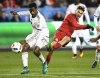Toronto FC's Jonathan Osorio, right, shoots past Philadelphia Union's Warren Creavalle during first half MLS soccer playoff action in Toronto, Wednesday, October 26. Creavalle, a former Tornto FC midfielder, has been making his mark off the field in recent months. THE CANADIAN PRESS/Frank Gunn