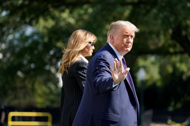 President Donald Trump and first lady Melania Trump walk to board Marine One at the White House, Tuesday, Sept. 29, 2020, in Washington, for the short trip to Andrews Air Force Base en route to Cleveland for first debate against Democrat Joe Biden. THE CANADIAN PRESS/AP/Carolyn Kaster