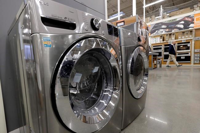 A clothes washer, left, and dryer, centre, are on display at a Home Depot store location in Boston on January 27, 2020. THE CANADIAN PRESS/AP, Steven Senne