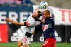 Toronto FC's Omar Gonzalez (44) and New England Revolution's Teal Bunbury (10) vie for a head ball during the second half of an MLS soccer match&nbsp;in Foxborough, Mass., Wednesday, Oct. 7, 2020. Gonzalez can make a tackle or a latte, and he's&nbsp;whipping up specialty coffees for his teammates while they are spending time at their pandemic home away from home in East Hartford, Connecticut.THE CANADIAN PRESS/AP-Steven Senne
