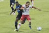 Toronto FC midfielder Nick DeLeon (18) is challenged by Montreal Impact midfielder Victor Wanyama (2) during second half MLS soccer action in Montreal, Friday, Aug. 28, 2020. THE CANADIAN PRESS/Graham Hughes