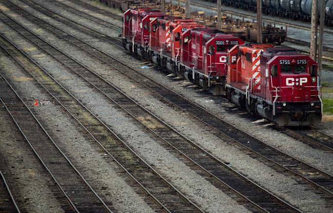 Canadian Pacific Rail locomotives sit idle at the company's Port Coquitlam yard east of Vancouver, B.C., on May 23, 2012. Canadian Pacific will get full ownership of the cross-border Detroit River rail tunnel through a deal with OMERS Infrastructure. THE CANADIAN PRESS/Darryl Dyck