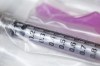 A needle and syringe used to administer a flu shot is shown in Virgil, Ont., Monday, October 5, 2020. THE CANADIAN PRESS/Tara Walton