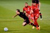 New York Red Bulls' Jared Stroud, left, falls under pressure from Toronto FC's Nick DeLeon, centre, and Marky Delgado, right, during the first half of an MLS soccer match, Wednesday, Oct. 14, 2020, in East Hartford, Conn.As a gruelling stretch of five games in 16 days comes to a close, league-leading Toronto FC has something to look forward to.THE CANADIAN PRESS/AP/Jessica Hill