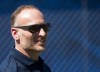 Toronto Blue Jays President Mark Shapiro watches during baseball spring training in Dunedin, Fla., on Friday, February 24, 2017/ Short on specifics and long on bullishness, Shapiro set an optimistic tone during his first general media availability since the team was eliminated from the post-season a few weeks ago. THE CANADIAN PRESS/Nathan Denette