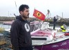 Indigenous fisherman Robert Syliboy stands on the wharf in Saulnierville, N.S. on Wednesday, Oct. 21, 2020. Tensions remain high over an Indigenous-led lobster fishery that has been the source of conflict with non-Indigenous fishermen. THE CANADIAN PRESS /Andrew Vaughan