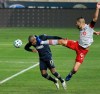 Sergio Santos, left, of the Philadelphia Union heads the ball into the goal in front of Omar Gonzalez of Toronto FC during the first half of an MLS match Saturday, Oct. 24, 2020, in Chester, Pa.&nbsp;Santos scored three goals as the Philadelphia Union thrashed an understrength Toronto FC 5-0 in a top-of-the-table showdown Saturday night, ending TFC's undefeated run at nine games.THE CANADIAN PRESS/Charles Fox/The Philadelphia Inquirer via AP