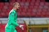 Red Star's goalkeeper Milan Borjan gestures during the Champions League group B soccer match between Red Star and Olympiacos, in Belgrade, Serbia on October 1, 2019, Canadian international goalkeeper Milan Borjan, who plays his club soccer in Serbia, says he plans to sue a rival club official for cyberbullying. The Red Star Belgrade 'keeper points the finger at Partizan vice-president Vladimir Vuletic after a social media post with a doctored photo of Borjan and his three-year-old son Filip. The feud has drawn plenty of attention from Serbian media. THE CANADIAN PRESS/AP, Darko Vojinovic
