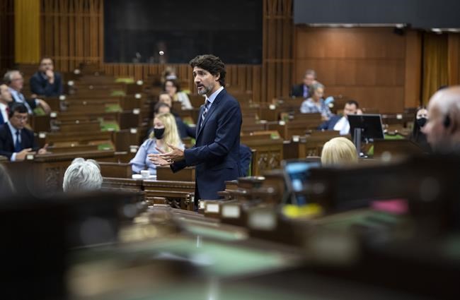 Prime Minister Justin Trudeau rises during Question Period in the House of Commons on Parliament Hill, in Ottawa, Tuesday, Sept. 29, 2020. Opposition parties are poised to approve a parliamentary probe of the Trudeau government