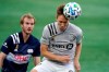 Montreal Impact's Lassi Lappalainen, right, heads the ball as New England Revolution's Henry Kessler, left, pursues during the first half of an MLS soccer match, Wednesday, Sept. 23, 2020, in Foxborough, Mass. THE CANADIAN PRESS/AP, Steven Senne