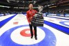 Team Newfoundland and Labrador skip Brad Gushue holds the Brier Tankard trophy after defeating Team Alberta in the Brier curling final in Kingston, Ont., on March 8, 2020. THE CANADIAN PRESS/Sean Kilpatrick