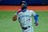 Toronto Blue Jays' Teoscar Hernandez celebrates his solo home run off Tampa Bay Rays pitcher Ryan Yarbrough during the second inning of a baseball game Friday, Aug. 21, 2020, in St. Petersburg, Fla. THE CANADIAN PRESS/AP, Chris O'Meara