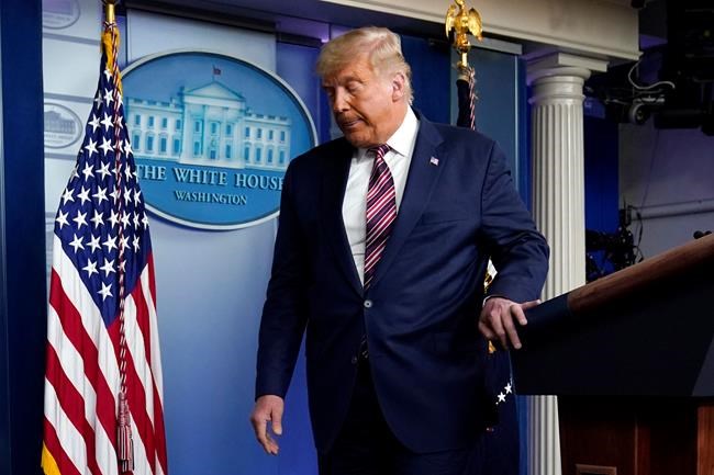 President Donald Trump leaves the podium after speaking at the White House, Thursday, Nov. 5, 2020, in Washington. His back against the wall, a frustrated Donald Trump is lashing out, spinning an elaborate conspiracy theory as he tries to maintain his grasp on the presidency. THE CANADIAN PRESS/AP, Evan Vucci