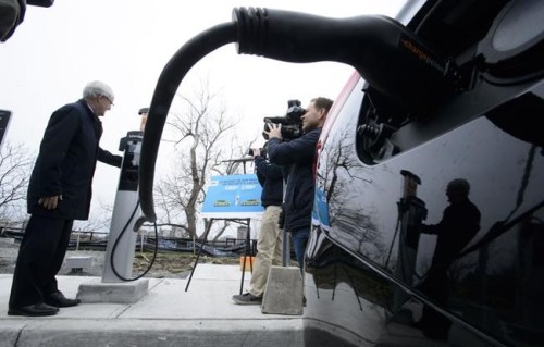 Marc Garneau, Minister of Transport, holds a photo opportunity at a new charge station for electric vehicles on Parliament Hill in Ottawa on Wednesday, May 1, 2019, to mark the coming into effect of the Incentive for Zero-Emission Vehicles Program. Garneau says he wants to extend the zero-emission vehicle rebate program, which is on track to run out of money more than a year ahead of schedule. THE CANADIAN PRESS/Sean Kilpatrick