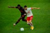 New York Red Bulls midfielder Dru Yearwood, left, fights for the ball against Toronto FC midfielder Jonathan Osorio during an MLS soccer match in Harrison, N.J., on November 8, 2020. THE CANADIAN PRESS/AP, Eduardo Munoz Alvarez