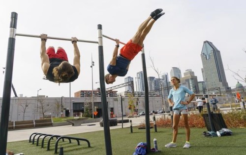 People work out at an outdoor gym in downtown Montreal, on Friday, Nov. 6, 2020. A new poll suggests many Canadians are gaining weight because they're eating more and exercising less during COVID-19 pandemic. THE CANADIAN PRESS/Paul Chiasson