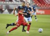 Toronto FC forward Pablo Piatti (7) cuts past Vancouver Whitecaps defender Ali Adnan (53) during first half MLS Canadian Championship soccer action in Toronto on Friday, August 21, 2020. Barring a new agreement, Toronto FC is parting ways with designated player Pablo Piatti. THE CANADIAN PRESS/Nathan Denette