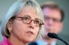 British Columbia Health Minister Adrian Dix looks on as Provincial Health Officer Dr. Bonnie Henry addresses the media during a news conference at the BC Centre of Disease Control in Vancouver B.C., Tuesday, Jan. 28, 2020. British Columbia has recorded 566 new cases of COVID-19, which officials say is the
