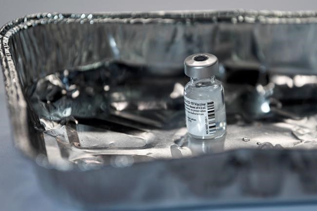 A vial of the Pfizer-BioNTech COVID-19 vaccine at the Louisa Jordan Hospital in Glasgow, Scotland, Tuesday Dec. 8, 2020. THE CANADIAN PRESS/AP-POOL, Jeff J Mitchell