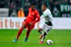 Bayern's Alphonso Davies, left, challenges for the ball with Moenchengladbach's Alassane Plea during the German Bundesliga soccer match between Borussia Moenchengladbach and Bayern Munich at the Borussia Park in Moenchengladbach, Germany on December 7, 2019. Davies, in a historic first, and Kadeisha Buchanan have both made FIFPRO's list of the top 55 soccer players in the world. Davies, one of 11 newcomers to the honour roll, is the first North American player to appear on the men's List of 55. FIFPRO which represents some 65,000 pro soccer players worldwide, invited players to vote for the world's best 11. The top 55 names in that voting were released Thursday. THE CANADIAN PRESS/AP, Martin Meissner