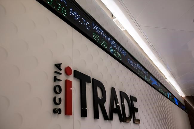 A sign for Scotiabank's iTRADE at the Scotiabank Plaza Concourse is shown in Toronto on Wednesday Nov. 8, 2017.THE CANADIAN PRESS/Doug Ives