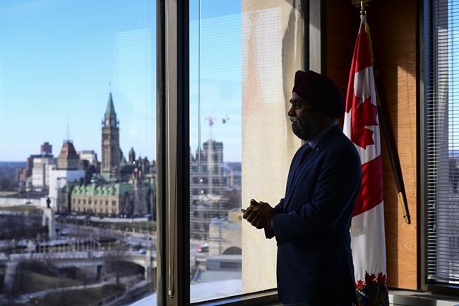 Minister of National Defence Harjit Sajjan takes part in a year-end interview with The Canadian Press at National Defence Headquarters in Ottawa on Thursday, Dec. 17, 2020. THE CANADIAN PRESS/Sean Kilpatrick