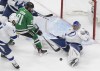 Tampa Bay Lightning goalie Andrei Vasilevskiy (88) makes the save on Dallas Stars' Tyler Seguin (91) during third period NHL Stanley Cup finals action in Edmonton on Monday, September 28, 2020. The NHL and the NHL Players' Association reached an agreement Sunday for a 56-game season beginning Jan. 13. THE CANADIAN PRESS/Jason Franson