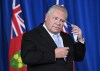 Ontario Premier Doug Ford holds a press conference at Queen's Park during the COVID-19 pandemic in Toronto on Monday, December 21, 2020. Ford says a decision has yet to be made on whether or not the Toronto Maple Leafs and Ottawa Senators will be permitted to play home games with the province set to go into lockdown amid soaring COVID-19 numbers. THE CANADIAN PRESS/Nathan Denette