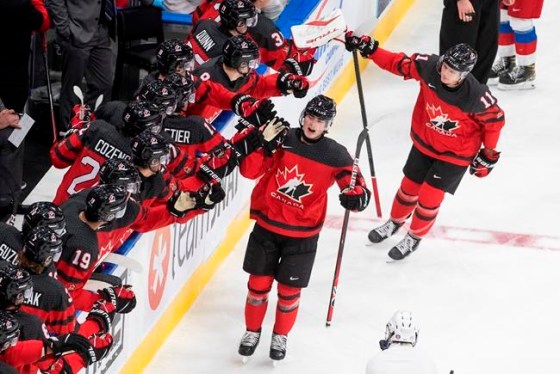 Canada's Jamie Drysdale (6) and Cole Perfetti (11) celebrate a goal against Russia during third period IIHF World Junior Hockey Championship pre-competition action in Edmonton on Wednesday, December 23, 2020. THE CANADIAN PRESS/Jason Franson