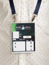 An example of a credential with the COVID-19 contact tracing technology TraceSafe is shown in this undated handout photo. What looks like a thin pack of gum is attached Braden Schneider's event credential at the world junior hockey championship in Edmonton. It's a beacon providing contact-tracing capability should the Canadian defenceman test positive for the COVID-19 virus. It also warns him if he stands to close to someone else for too long. THE CANADIAN PRESS/HO - TraceSafe MANDATORY CREDIT