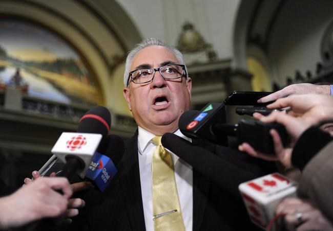 Joe Hargrave speaks to reporters following the throne speech at the Legislative Building in Regina on Wednesday, Oct. 25, 2017. The Saskatchewan highways minister has been the focus of Opposition criticism after it was revealed he travelled to California during the holidays. THE CANADIAN PRESS/Mark Taylortravelle