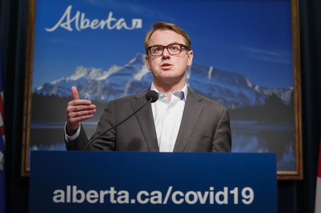 Alberta Minister of Health Tyler Shandro speaks about measures to prevent the spread of COVID-19, in Calgary on Friday, May 29, 2020. Two Alberta cabinet ministers say they've been getting an earful from constituents about their colleagues jetting off to tropical locales contrary to public health guidelines -- and that they're right to be angry. THE CANADIAN PRESS/Jeff McIntosh