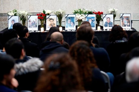 People gather on Jan. 10, 2020, at the University of Manitoba in Winnipeg for a vigil organized by the University of Manitoba Iranian Students Association (UMISA) for the Winnipeg victims killed in a plane crash in Iran. Victims from left to right are: Forough Khadem, Bahareh Hajesfandiari (41) Anisa Sadeghi (10) and Mohammad Sadeghi, Amir Hossein Ghorbani (21), Farzaneh Naderi (38) and Noojan Sadr (11), Amirhossien Ghasemi (32), Farhad Niknam (44), and Mojgan Daneshmand, Pedram Mousavi, Daria Mousavi (14) and Dorina Mousavi (9). THE CANADIAN PRESS/John Woods
