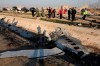 Authorities worked at the scene after a Ukrainian passenger jet carrying 176 people crashed in January 2020, shortly after takeoff from Tehran's main airport, killing all on board. Ralph Goodale, the former Liberal public safety minister designated as a special adviser on Canada's response to the crash, says Iran doesn’t have right to unilaterally offer compensation to victims' families in Canada and other countries. THE CANADIAN PRESS/AP, Ebrahim Noroozi