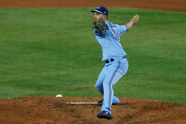 Toronto Blue Jays righty A.J. Cole pitches against the Miami Marlins during the ninth inning of a baseball game, Tuesday, Aug. 11, 2020, in Buffalo, N.Y. The Blue Jays have signed Cole to a minor league contract with an invitation to spirng training. THE CANDADIAN PRESS/AP, Jeffrey T. Barnes