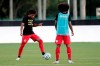 Toronto FC forwards Jahkeele Marshall-Rutty, left, and Jayden Nelson warm up before the team's MLS soccer match against the Montreal Impact, Thursday, July 16, 2020, in Kissimmee, Fla. Toronto FC midfielder Jahkeele Marshall-Rutty has been summoned by Canada, making the 16 year-old the youngest-ever call-up by the national men's team. THE CANADIAN PRESS/AP, John Raoux