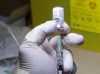 A Pfizer-BioNTech COVID-19 vaccine dose is prepared at The Michener Institute in Toronto on Monday, Dec. 14, 2020. Canada's COVID-19 vaccine rollout hits its one-month mark on Thursday, but questions remain about the inoculations themselves, how they're being distributed and what happens next.THE CANADIAN PRESS/Frank Gunn
