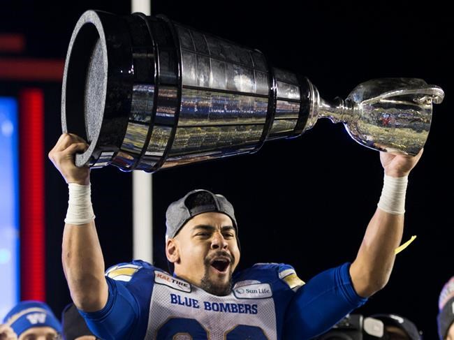 Winnipeg Blue Bombers' Andrew Harris celebrates winning the 107th Grey Cup against the Hamilton Tiger Cats in Calgary, Alta., Sunday, November 24, 2019. The Bombers have signed star running back Harris to a one-year contract extension.THE CANADIAN PRESS/Todd Korol
