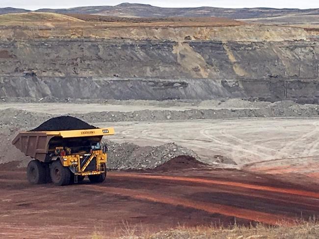 In this March 28, 2017, file photo, a dump truck hauls coal at Contura Energy's Eagle Butte Mine near Gillette, Wyo. Public opposition to the Alberta government's plans to expand coal mining in the Rocky Mountains appears to be growing. THE CANADIAN PRESS/AP/Mead Gruver, File