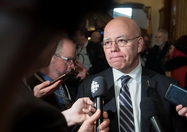 New Brunswick Green party Leader David Coon reacts to the provincial budget in Fredericton, Tuesday, March 10, 2020. Coon is calling on Natural Resources Minister Mike Holland to resign from cabinet because of a letter he wrote to the Energy and Utilities Board. THE CANADIAN PRESS/Stephen MacGillivray